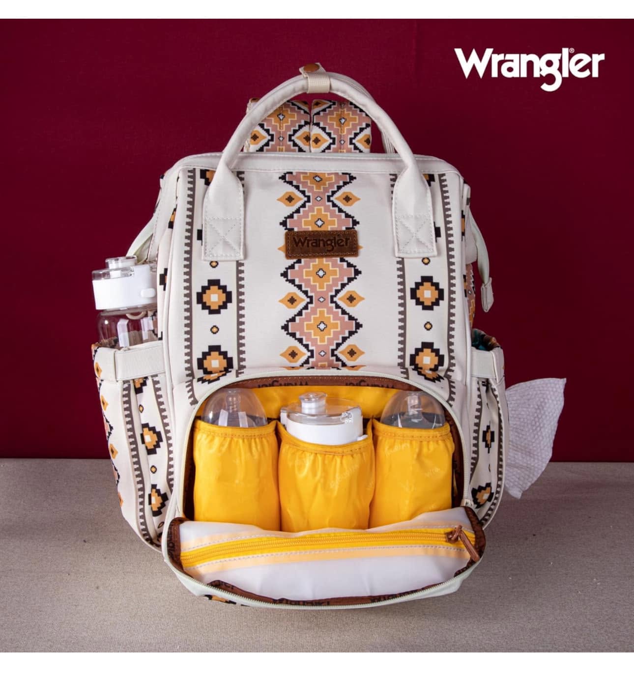 Cream western print Wrangler diaper backpack with multiple front bottle pockets
