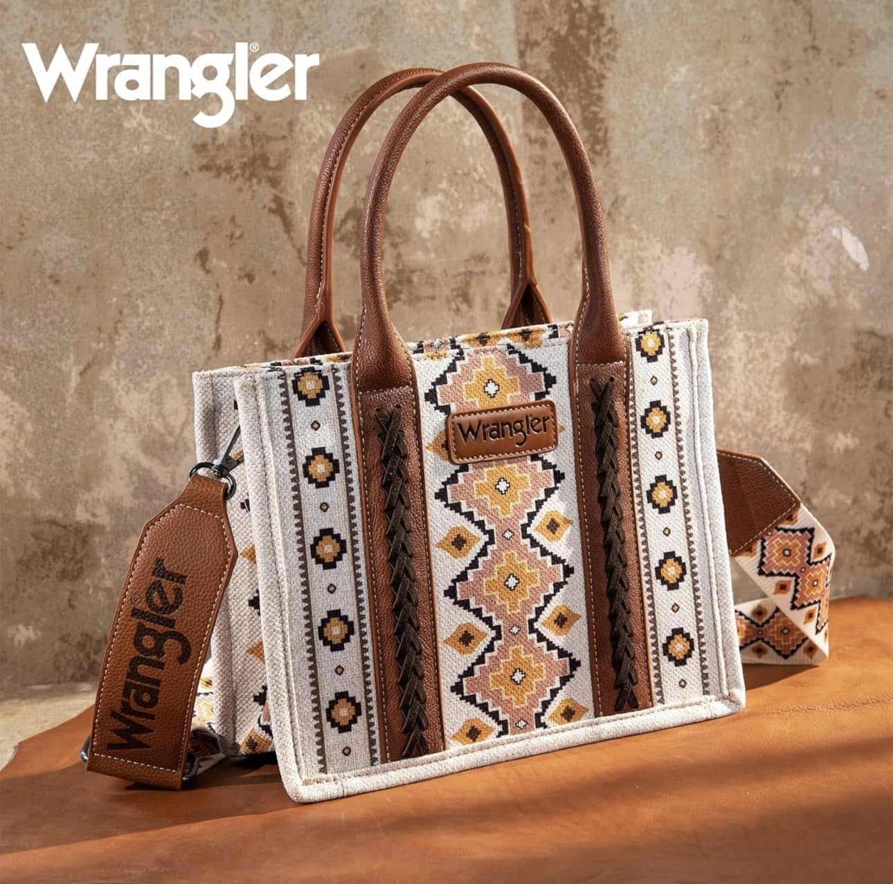 Neutral woven tote bag with warm ochre western pattern and brown leather details